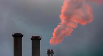 Only strong action on emissions can restore economic stability, UN climate chief says