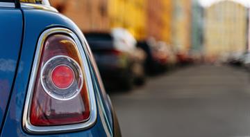 Parked cars are heating up cities by significantly contributing to urban heat island effect—especially darker cars